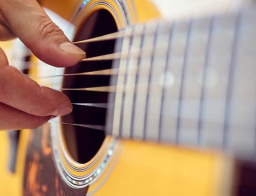 Applications mobiles pour progresser à la guitare